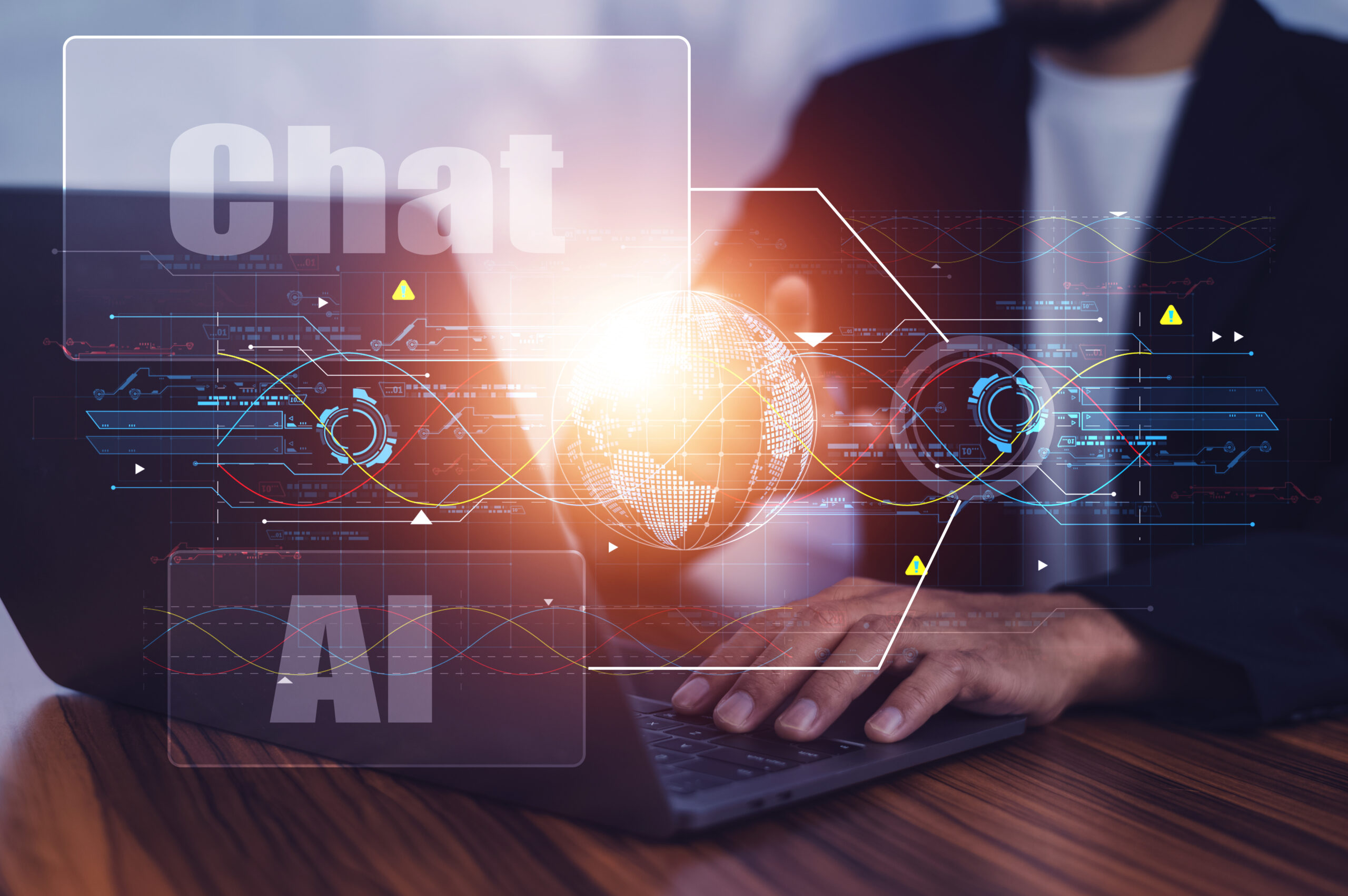 ChatGPTのコンセプト、コンピューターを使用する人々、ノートパソコンのキーボードで入力する横からの視点、AIまたは人工知能とのChatGPTチャット。ChatGPTのコンセプト